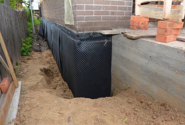 Happy homeowners after waterproofing job in Rancocas